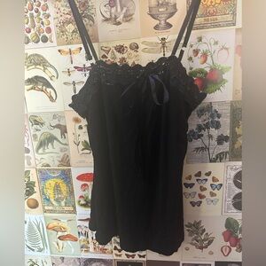 Small yde , black tank with ribbon sleeves.